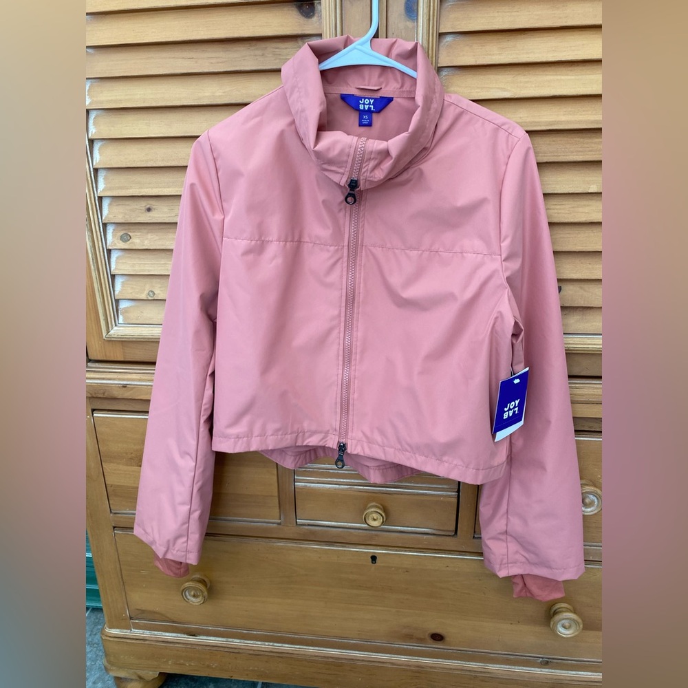 Rain & wind breaker, salmon color, lined, double front zippers, thumb hole cuffs